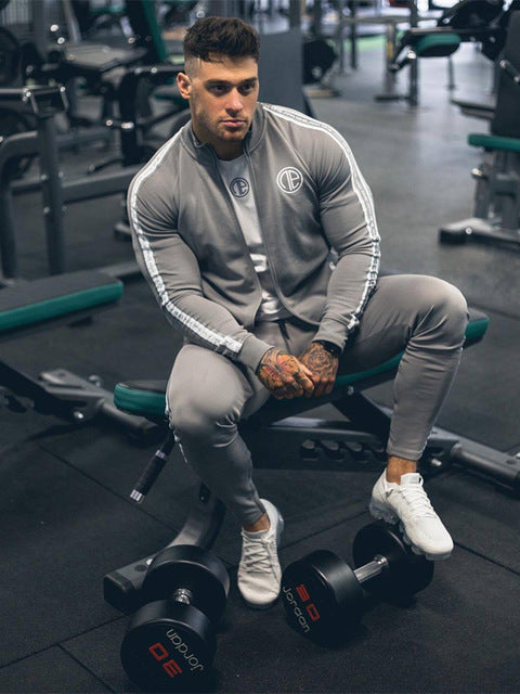 2019 Traje deportivo Hombres Chaqueta de culturismo Pantalones Trajes deportivos Medias de baloncesto Ropa Gimnasio Fitness Running Set Hombres Chándales 3XL